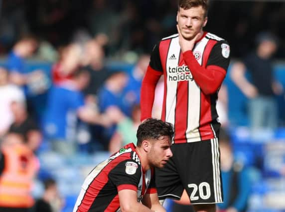 George Baldock and Lee Evans at full time