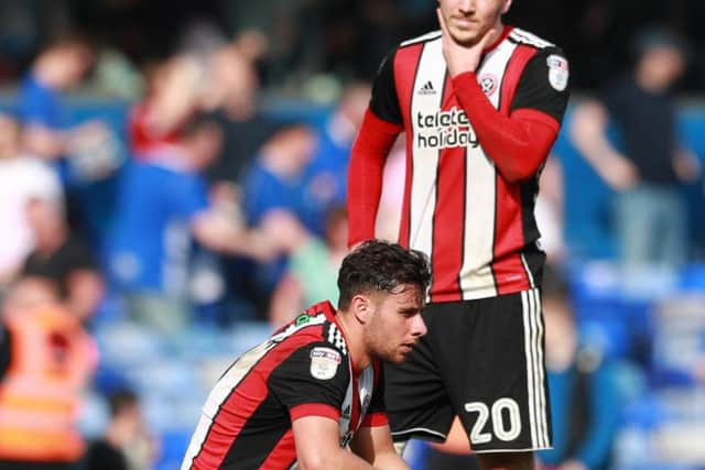 George Baldock and Lee Evans at full time