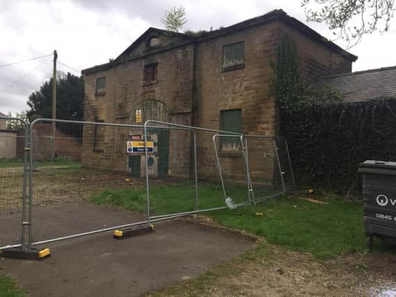 The derelict coach house in Hillsborough park