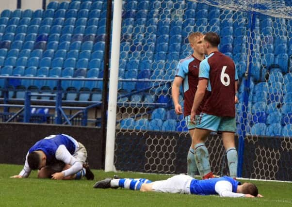 Jack Stobbs and Preslav Borukov fall to the floor in disappointment