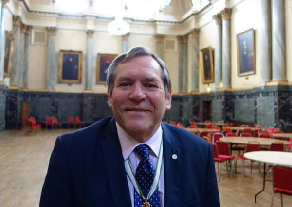 Master Cutler Ken Cooke in the opulent Cutlers Hall.