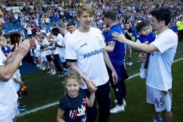 Glenn Loovens gets a guard of honour from his Sheffield Wednesday team mates. Pic: Steve Ellis