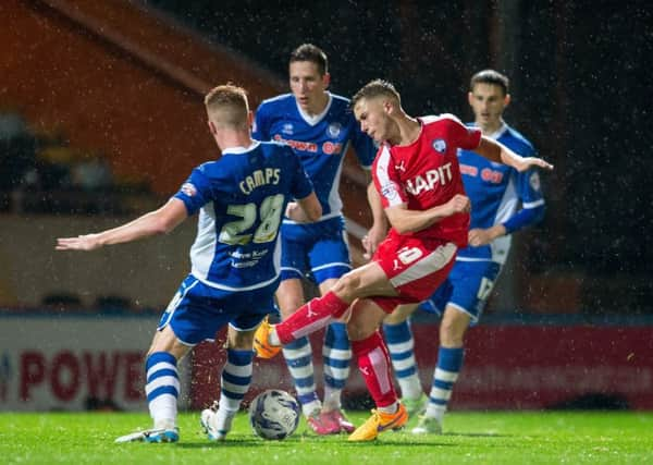 Rochdale vs Chesterfield - Jake Orrel has a shot blocked - Pic By James Williamson