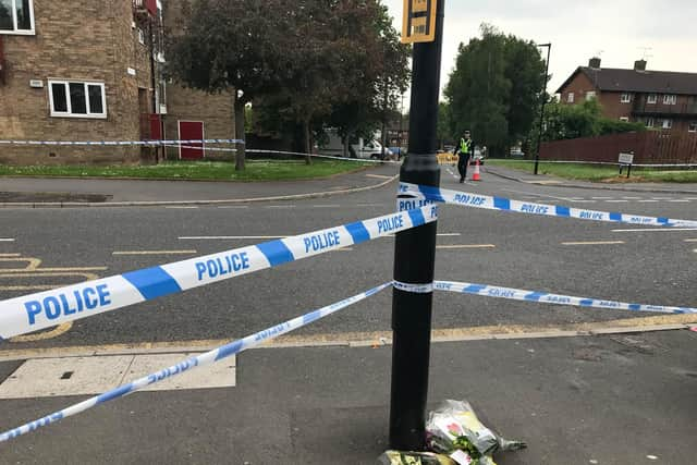 People have begun to leave floral tributes to murder victim, Sam Baker