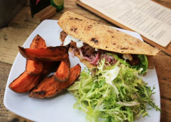 Tandoori spiced lamb, and lemon and thyme roast chicken chia seed flatbreads. Pictures Chris Etchells