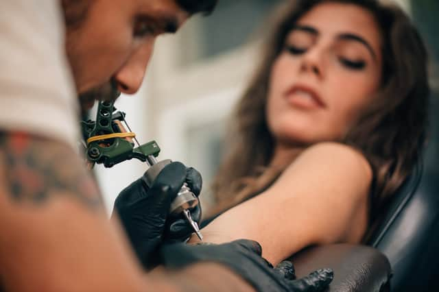 Do you trust someone enough to design a tattoo for you? (Photo: Shutterstock)